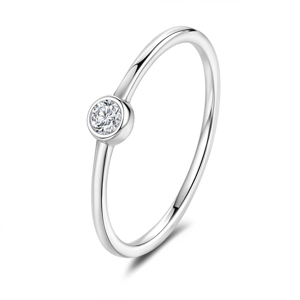 Simple round moissanite ring