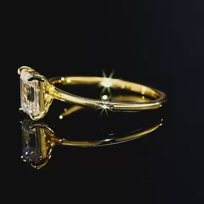 Emerald cut glossy moissanite ring