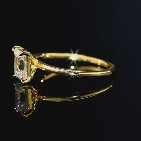 Emerald cut glossy moissanite ring