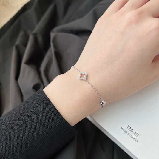 Simple sterling silver hollow four-leaf clover bracelet - Hastella.J